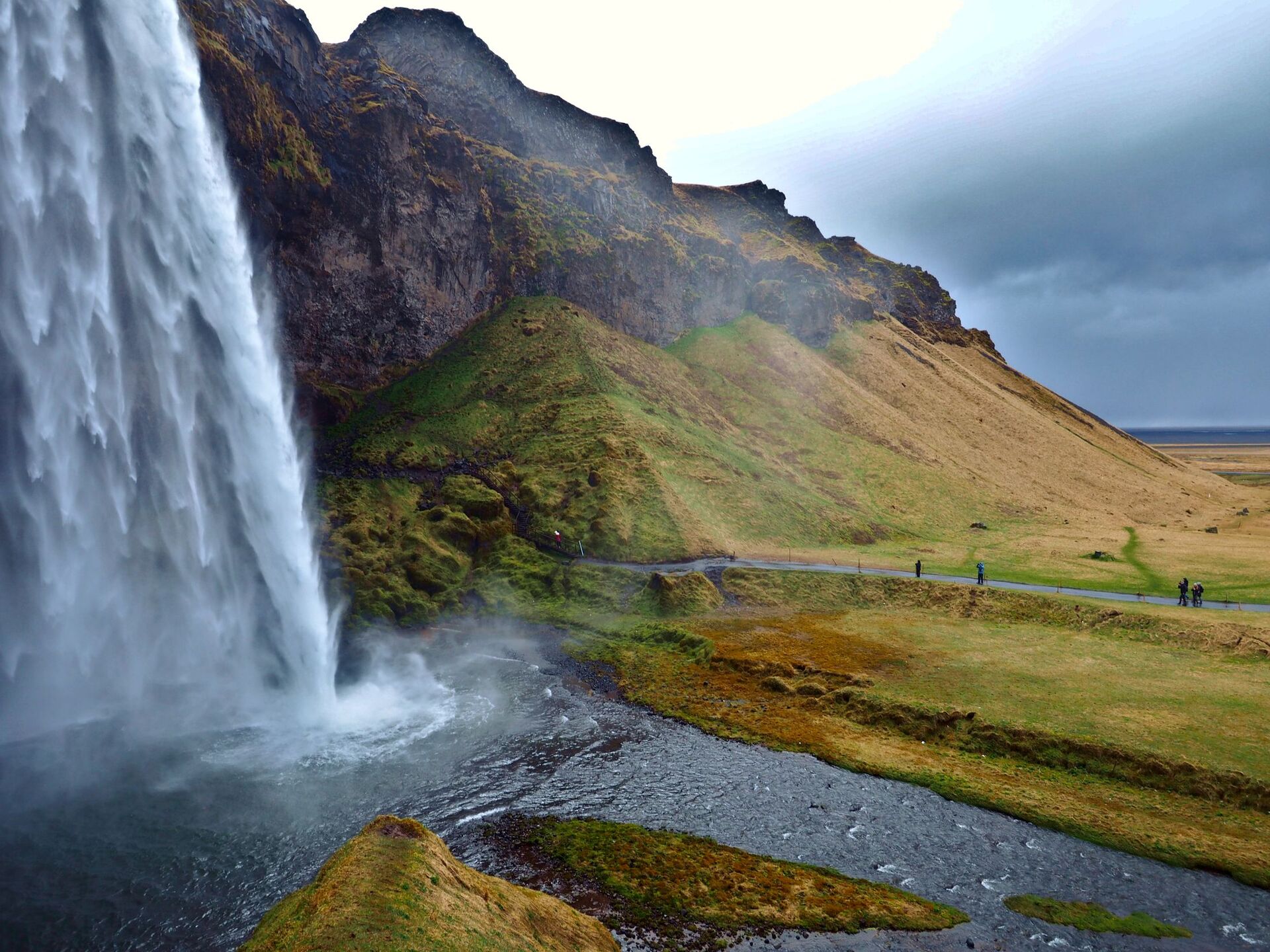 Seljalandsfoss falling from the Eyjafjöll cliffs